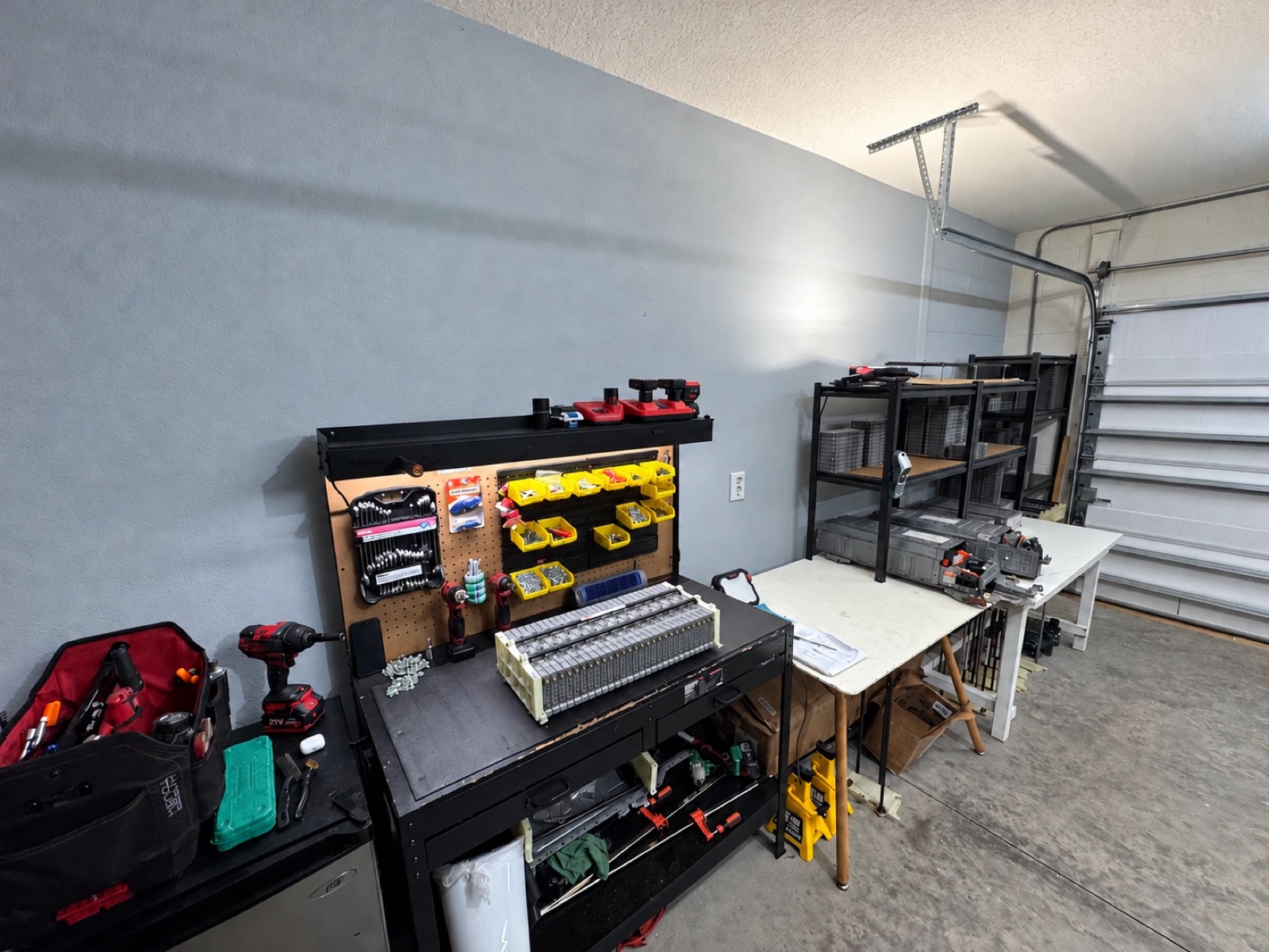 CJ&B shop with workbench and module racks